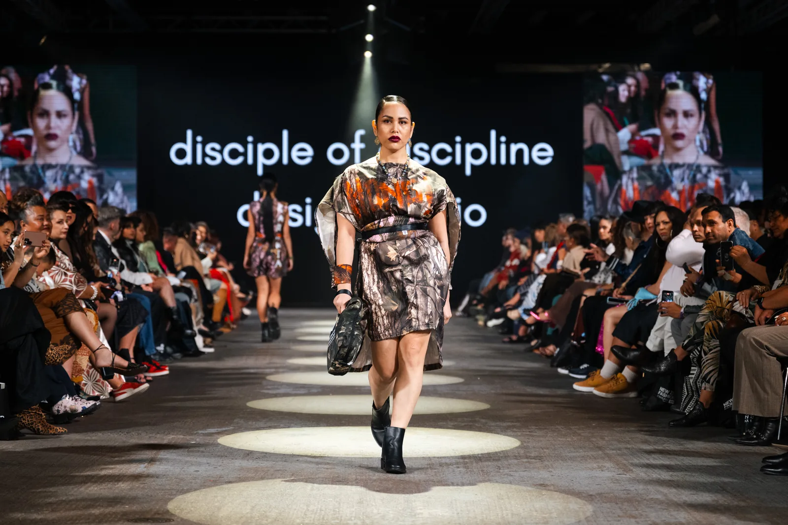 A copper and bronze print look on the New Zealand Fashion Week runway, under the Disciple of Discipline Design Studio name